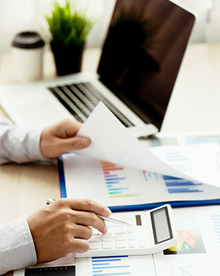 Payroll and Tax: Person doing simple calculations