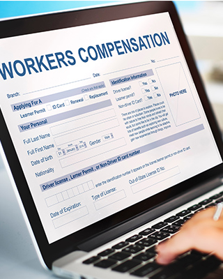 Workers' Comp: Person filling out form.